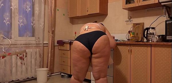  The fat girl prepares in panties and then removes them.